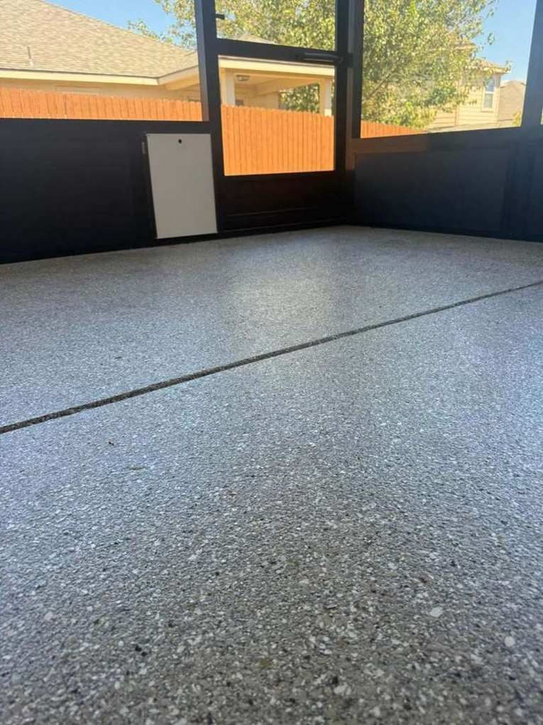 Full-flake coated floor across the Almanza screen room