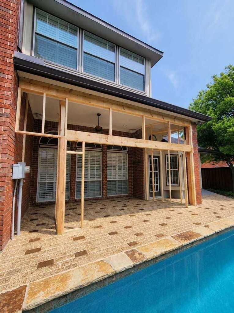 Stamp-and-stain cobblestone coating across the pool deck