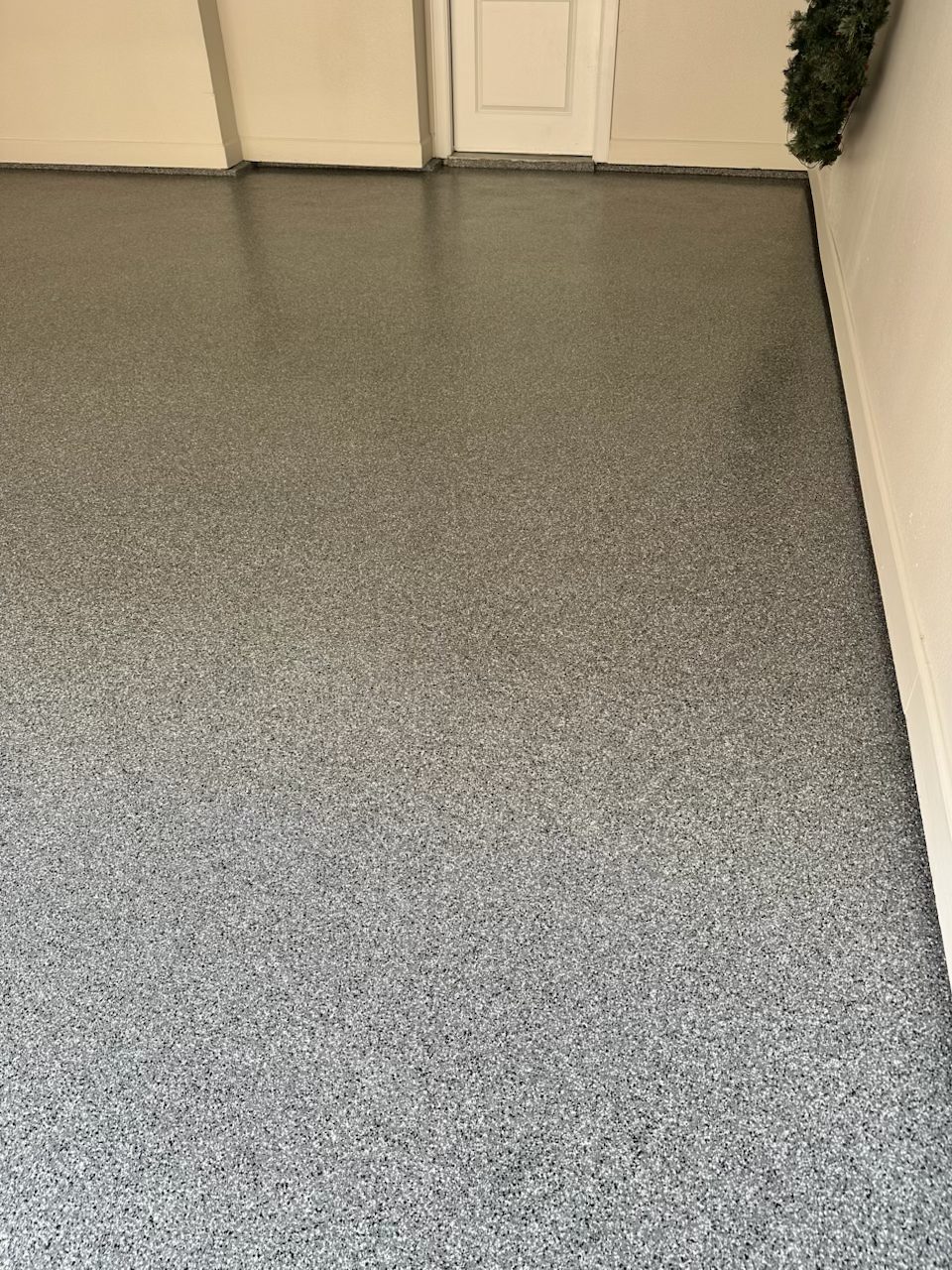 Polyaspartic flake garage floor installed in Parker County